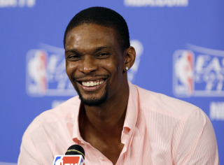 Chris Bosh says he'd take less money to stay with Heat