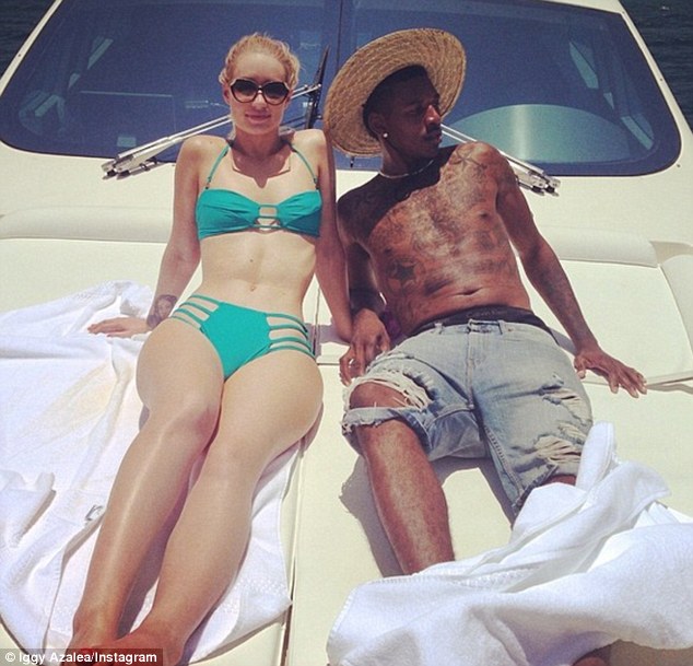 Now that's Fancy! Shipshape Iggy Azalea slips into green bikini for luxury …