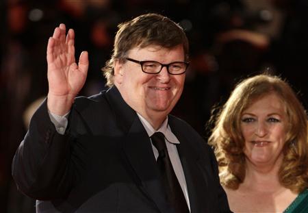 Michael Moore Uses Andrew Breitbart Against Wife in Divorce Case