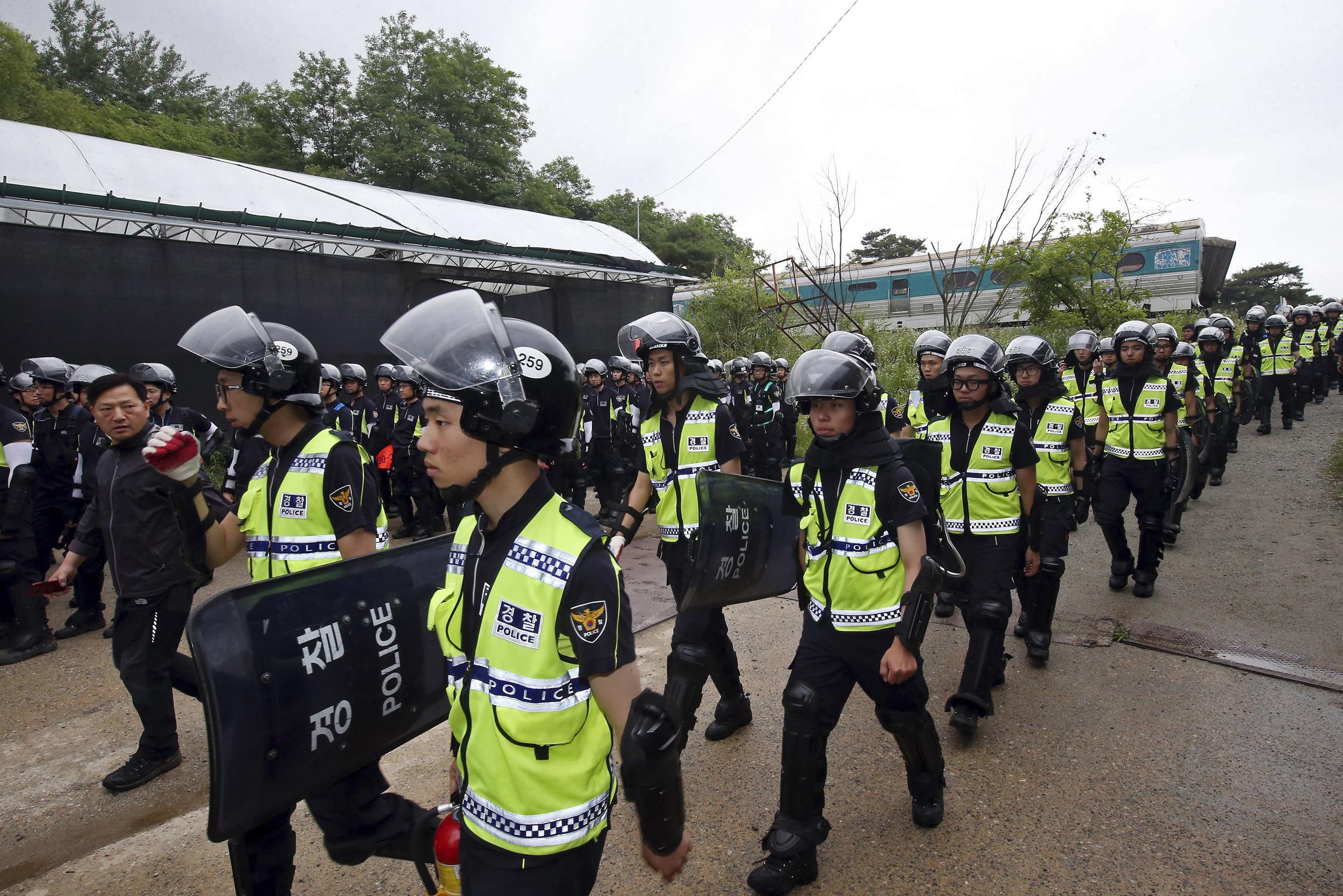 Billionaire's 'Cult' Compound Stormed in South Korea Ferry Case