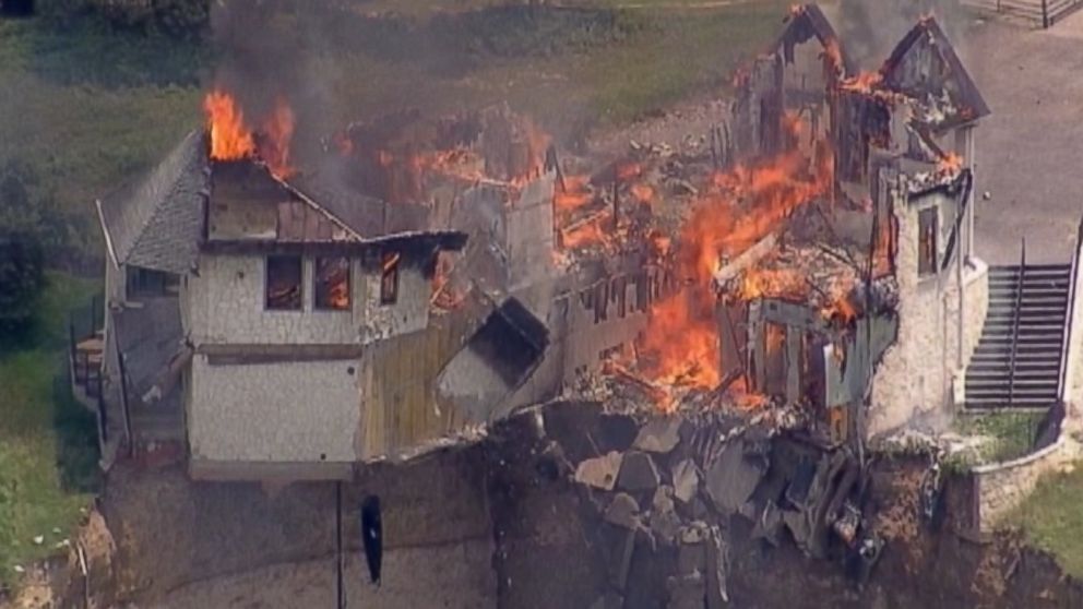 Texas Home Teetering on Cliff Dangles While Burning