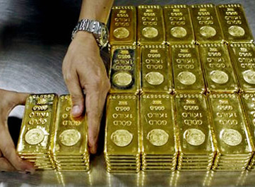 Gold price slips on stronger equities, but holds above $1300