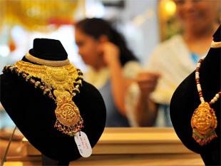 Gold steadies below 2 month high as European shares inch lower and Iraq crisis …