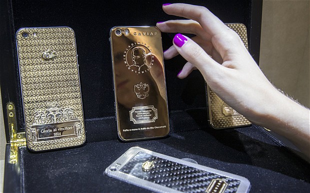 Vladimir Putin's face engraved on £2500 gold iPhone for 'patriotic Russians'