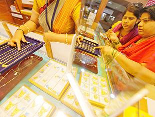 Gold eases on lower demand amid bearish overseas sentiment