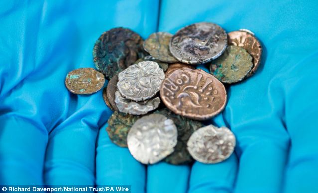 Iron Age coins found in a cave: 26 gold and silver pieces that have laid …