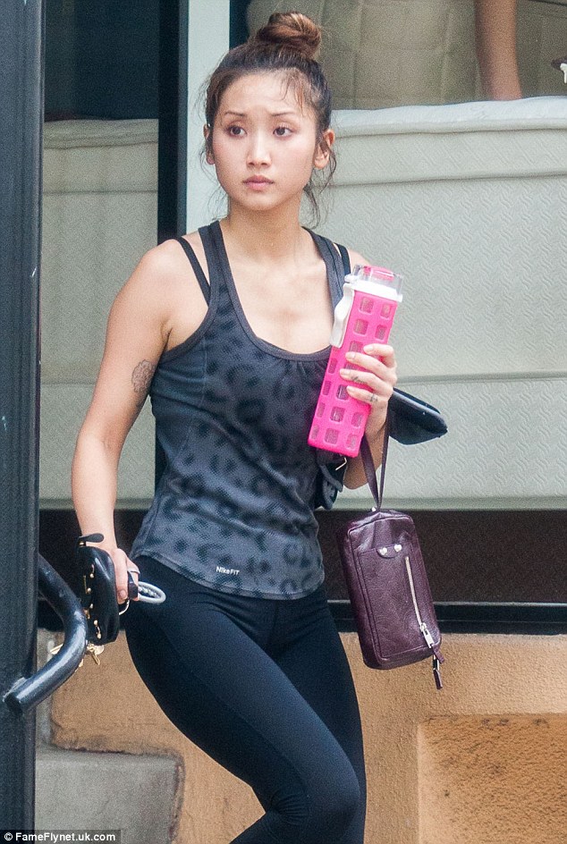 Ex-Disney star Brenda Song reveals her toned physique as she steps out for the …