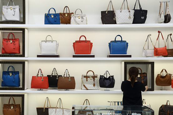 Popular or Overexposed? Michael Kors Walks Thin Line