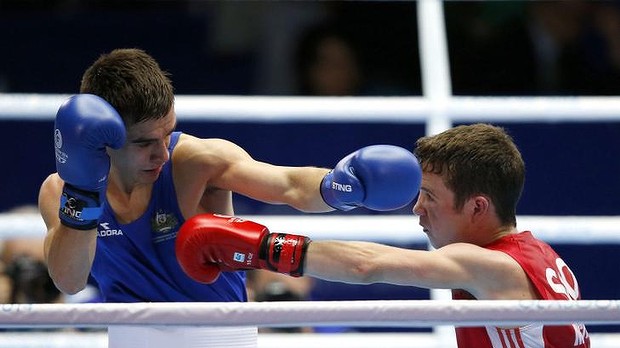 Boxer lambasts 'corrupt' officials as Aussies book gold medal bouts