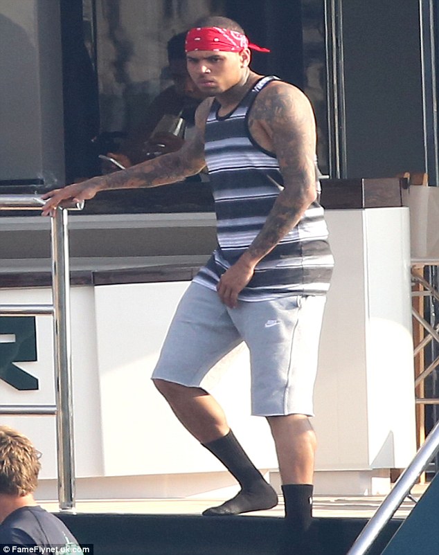 Chris Brown cavorts on luxury yacht and jet skis in French Riviera as he …