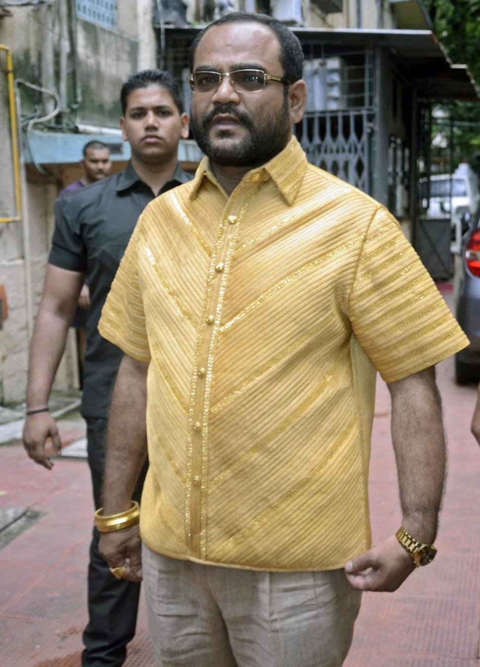 Indian businessman wears $211G gold shirt on stroll in Mumbai