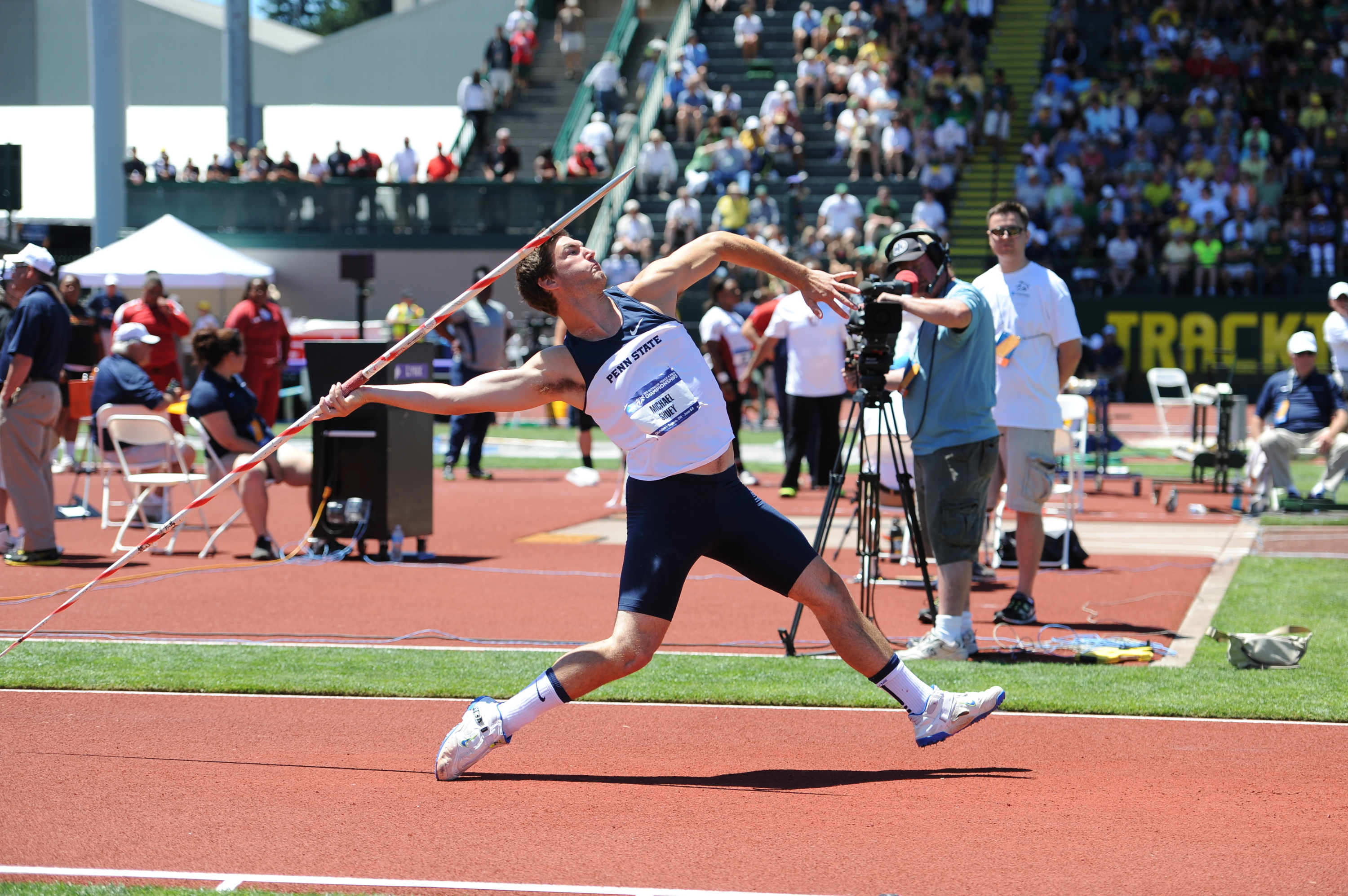 Shuey Breaks School Record, Wins Gold