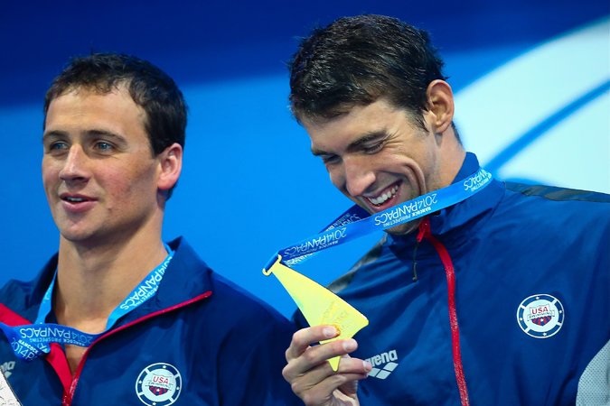 Michael Phelps, Unfazed by Poor Weather, Wins Gold Medal in the 100 Butterfly