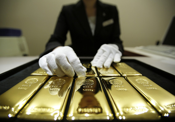 Gold settles down 0.1% as headwinds kick up