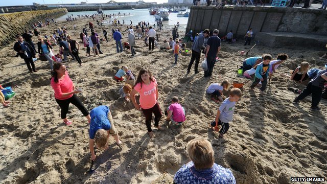 Gold-diggers continue to search Folkestone beach