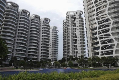 Lights off in Singapore's billionaires row as luxury house prices PLUNGE