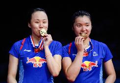 World doubles gold for China and Korea