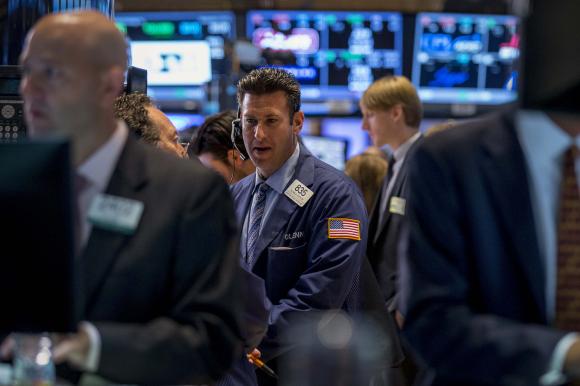 Wall Street ends mixed as Apple weighs on Nasdaq