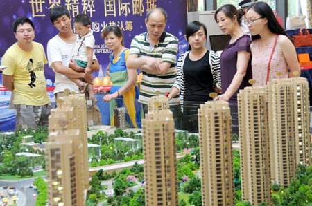 The exclusive high-end realty market bucks China's housing problems