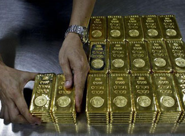 PRECIOUS-Gold drops below $1250/oz; platinum hits 7-month low