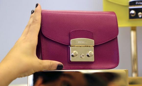 Italy's Furla plans sales push to cash in on affordable luxury boom