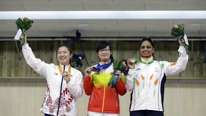 Chinese shooters grab 3 early gold medals