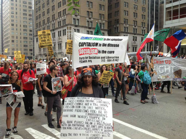 Anti-capitalist march in NYC mentions climate change; weather remains …