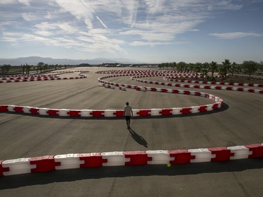 Desert community letting rich car buffs live trackside