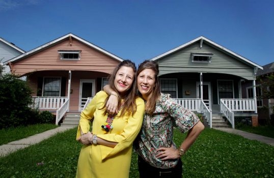 Identical twin sisters buy identical twin houses in Galveston