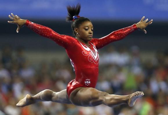 US gymnast Biles finishes with record four gold medals at championships