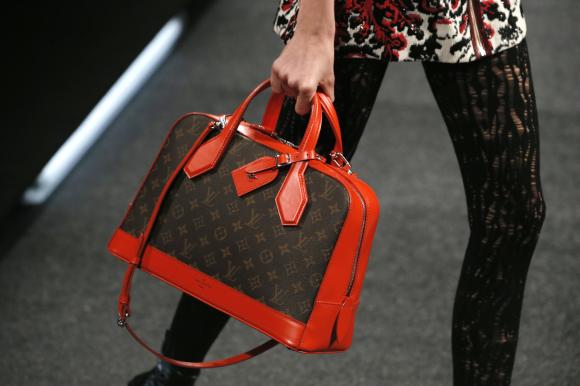 Global luxury goods sales growth to stabilize in 2015: Bain
