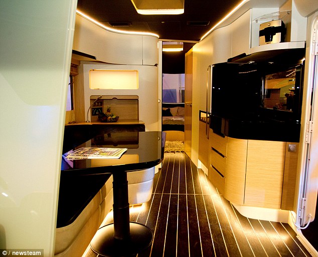 Caravisio caravan features cinema, touch screen shower and iPad-controlled …