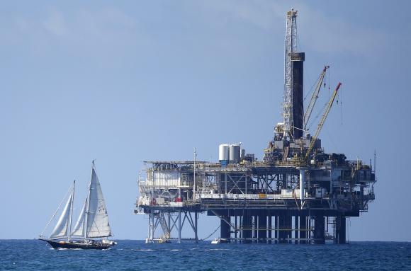 Oil falls below $86 as oversupply, global economy worries weigh