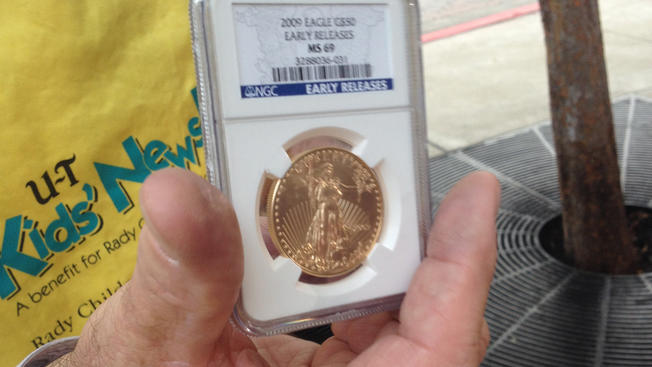 Pricey Gold Coin Donated to Kids' NewsDay